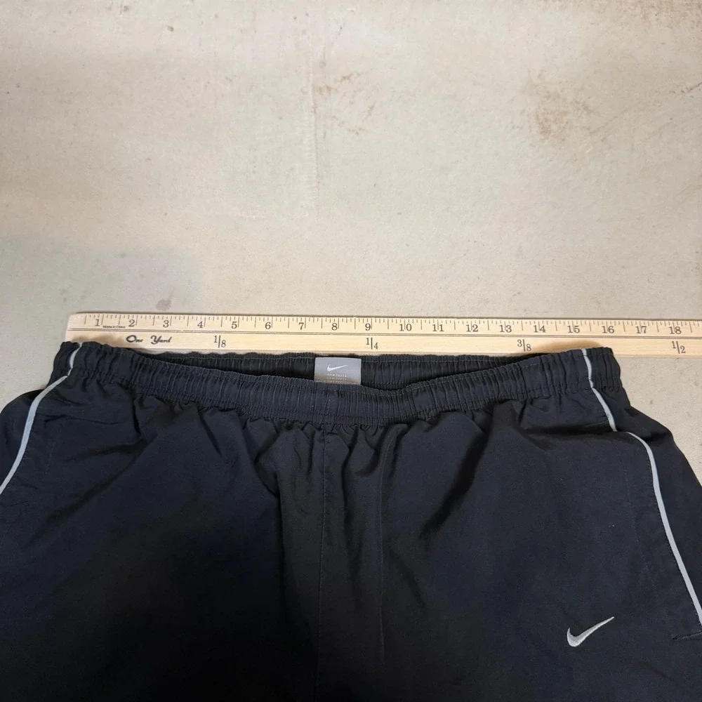 Nike Mens Black Nylon Mesh Lined Track Pants Large Windbreaker Swoosh RN 56323